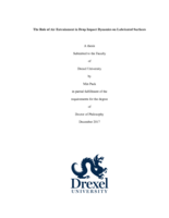 The role of air entrainment in drop impact dynamics on lubricated surfaces